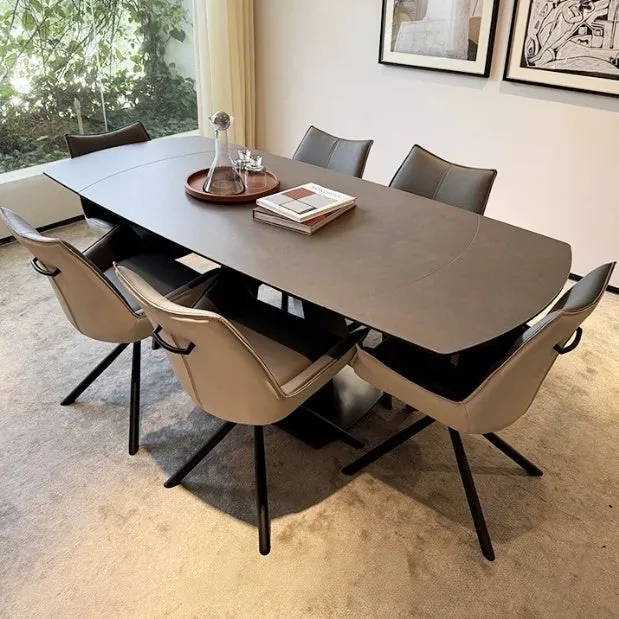 Table de salle à manger pivotante et extensible en forme de dalle de pierre avec pied central en acier