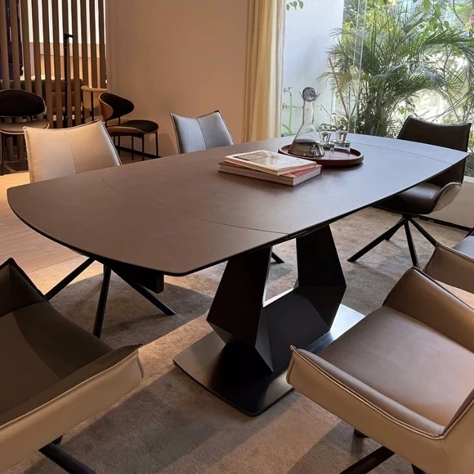 Table de salle à manger pivotante et extensible en forme de dalle de pierre avec pied central en acier