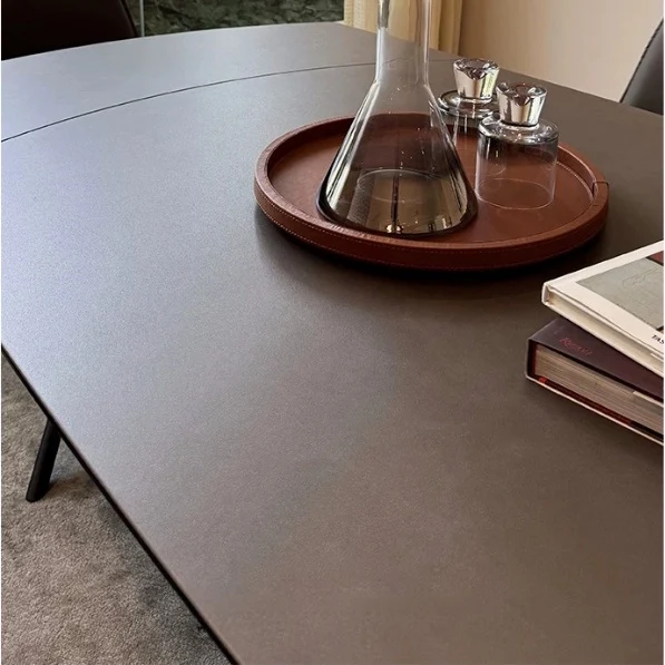 Table de salle à manger pivotante et extensible en forme de dalle de pierre avec pied central en acier