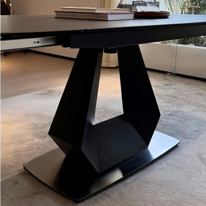Table de salle à manger pivotante et extensible en forme de dalle de pierre avec pied central en acier