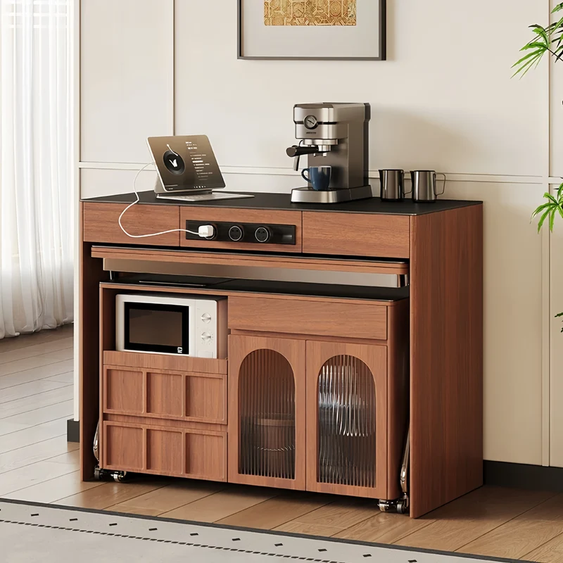 Îlot de cuisine avec comptoir en pierre frittée, table à manger extensible, pliable et mobile et grand meuble de rangement