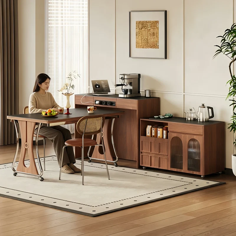 Îlot de cuisine avec comptoir en pierre frittée, table à manger extensible, pliable et mobile et grand meuble de rangement