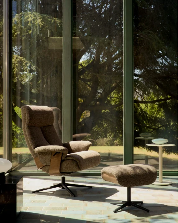 Toriel brown micro reclining swivel armchair with footrest and black legs