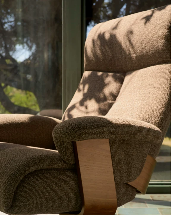 Toriel brown micro reclining swivel armchair with footrest and black legs