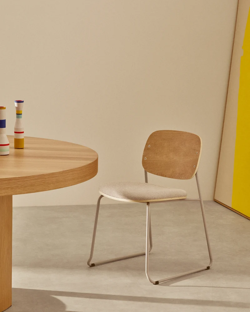 Meli stackable chair in poplar plywood with beige chenille seat and beige metal legs
