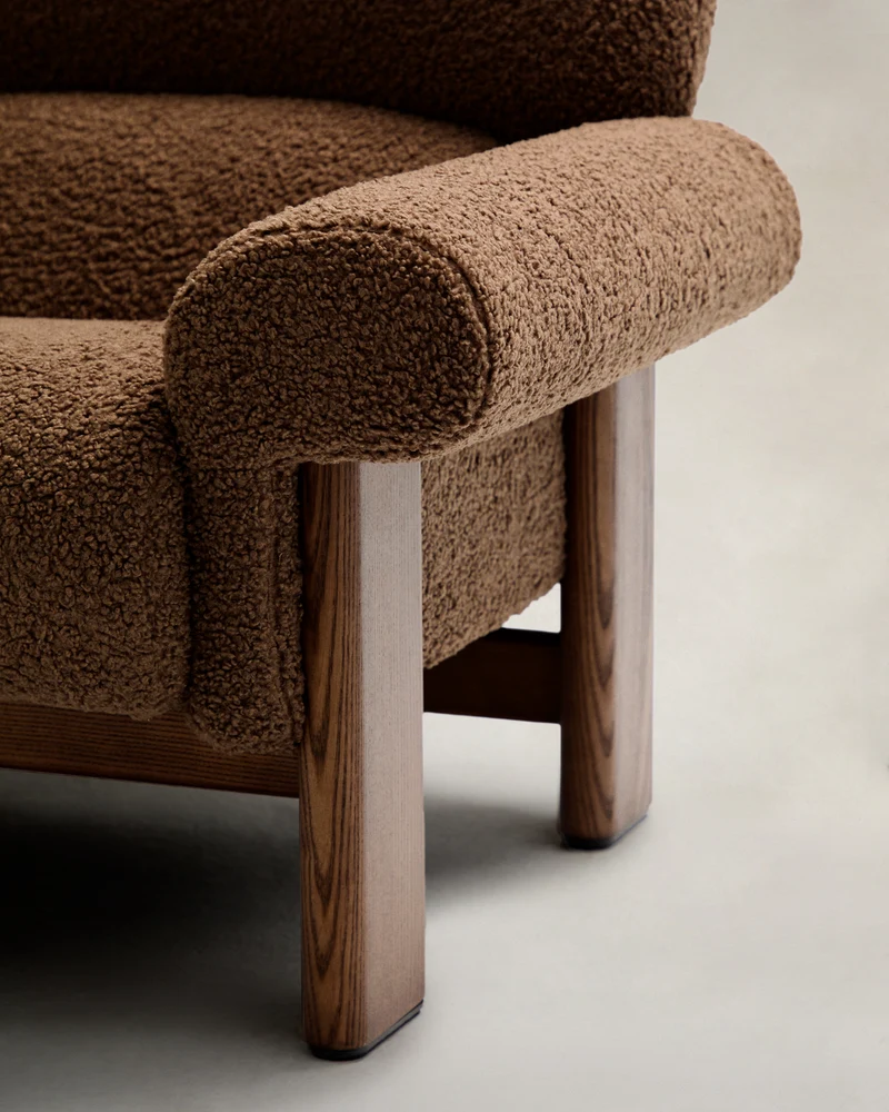 Nema armchair in taupe bouclé with solid ash wood legs in a walnut finish FSC 100%