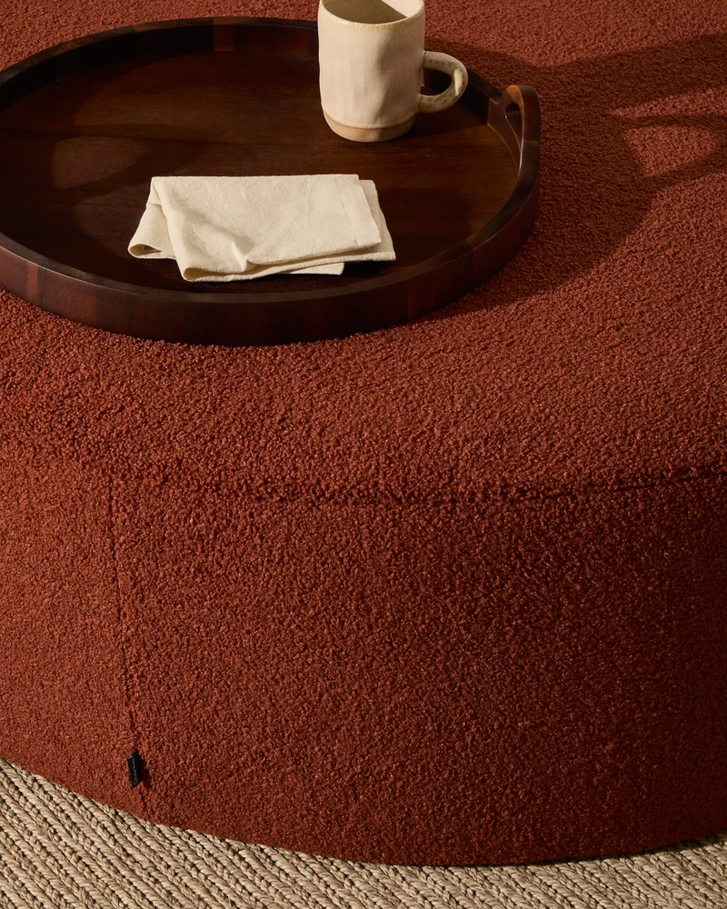 Kaeli footrest with removable cover in terracotta bouclé Ø 90 cm