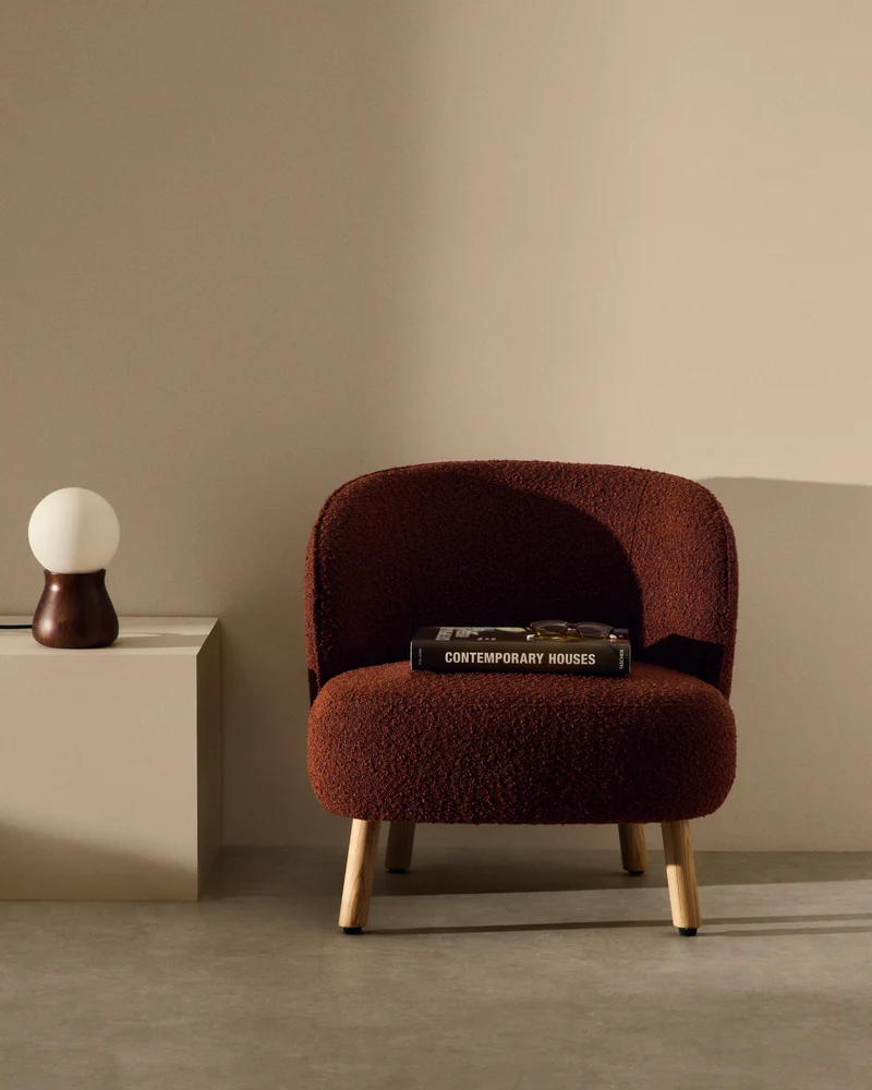 Ulit armchair in terracotta bouclé natural finish legs