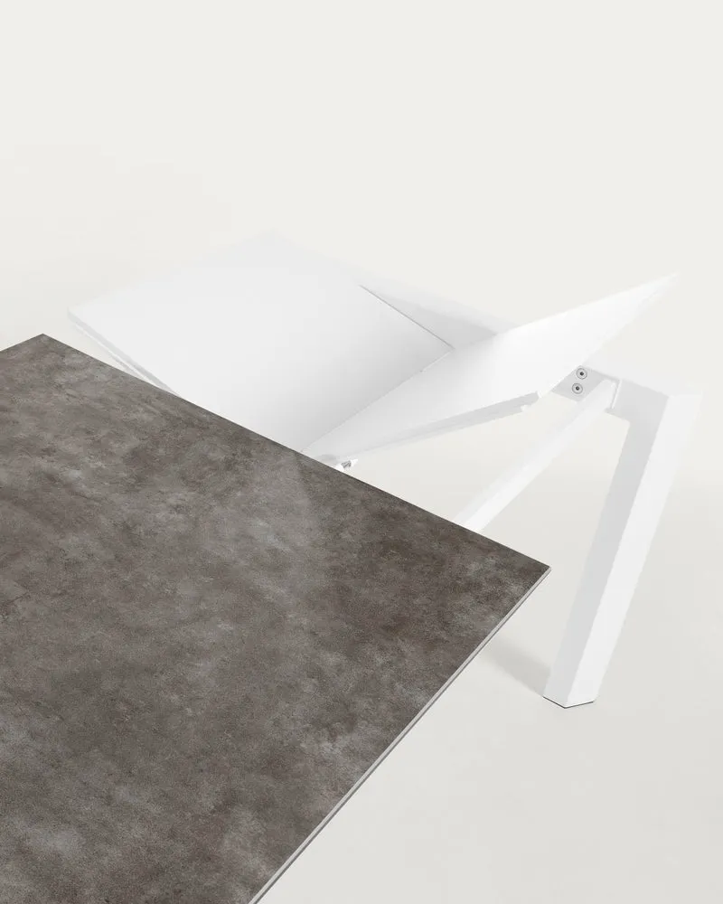 Axis extendable ceramic table in Vulcano Ceniza finish, white steel legs 120 (180) cm