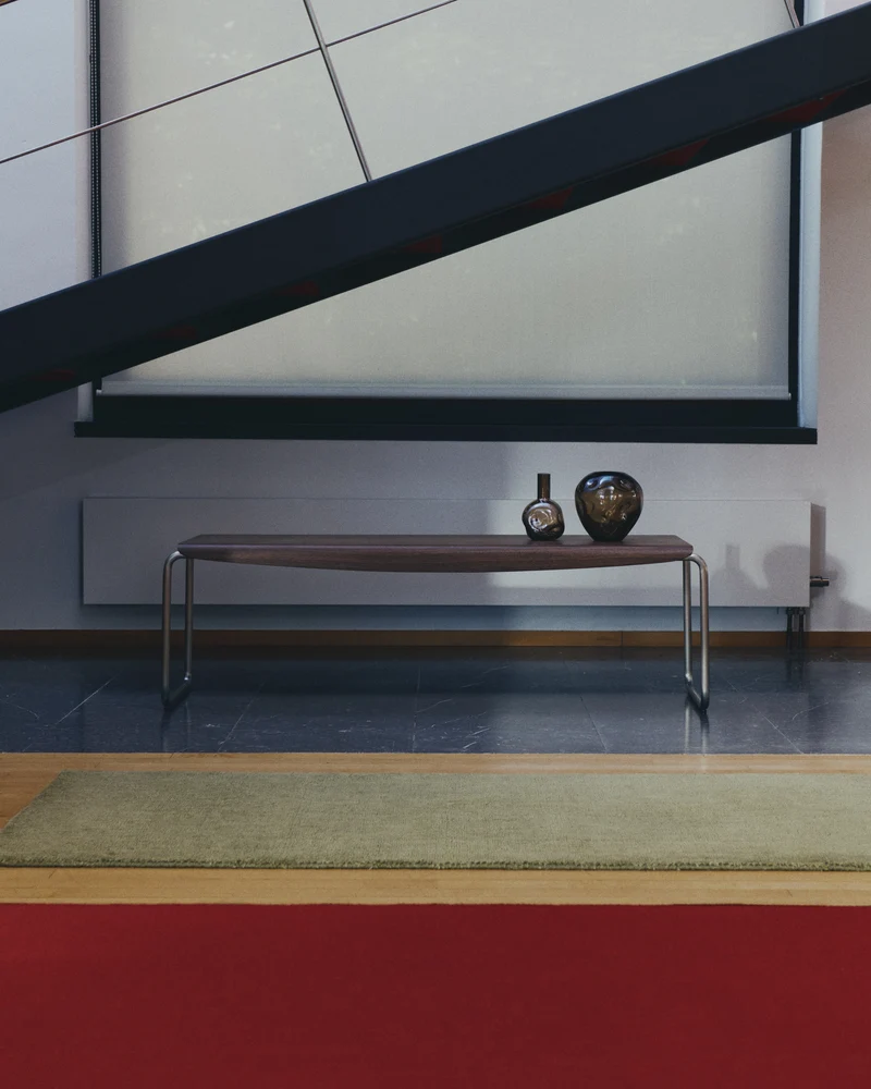Tarsel bench in walnut veneer with brushed stainless steel structure 142cm