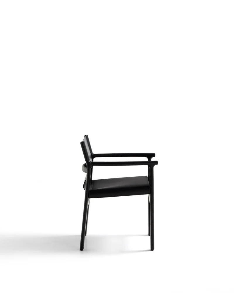 Jan chair made of black recycled leather fibres and FSC 100% solid ash wood with black finish