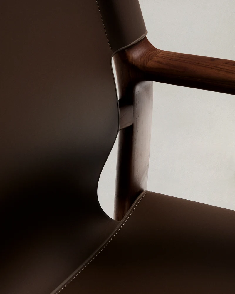 Jan chair made of dark brown recycled leather fibres and FSC 100% solid ash wood with walnut-coloured finish