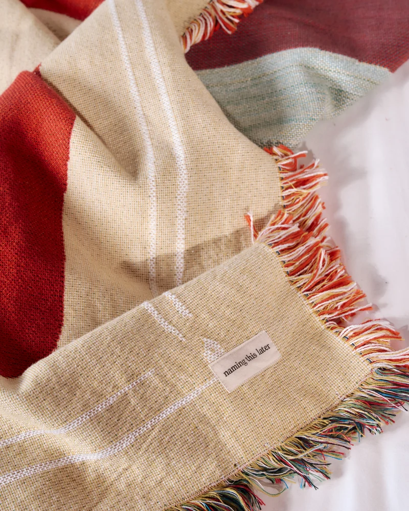 SOLAR DUSK THROW RUG