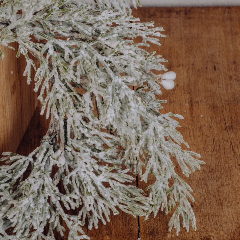 Couronne de sapin artificiel flocké
